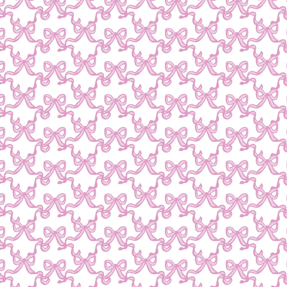 Pattern of pink bows on a white background