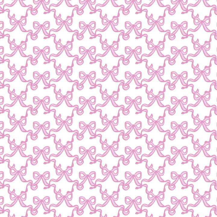 Pattern of pink bows on a white background